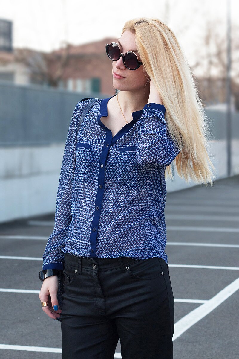 Fashion blogger Aurora Berill wearing a geometric printed shirt in a business casual look