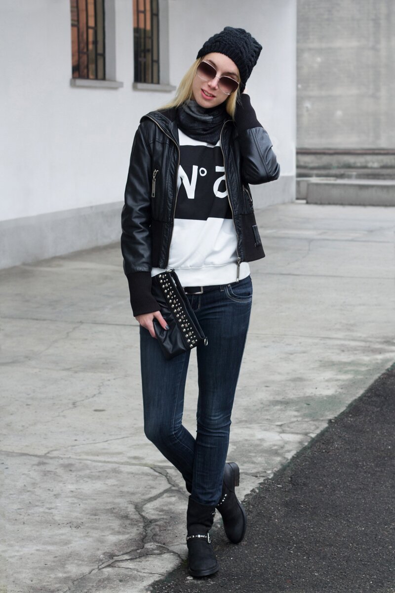 Fashion blogger Aurora Berill wearing Levis leather belt and Primadonna studded leather boots