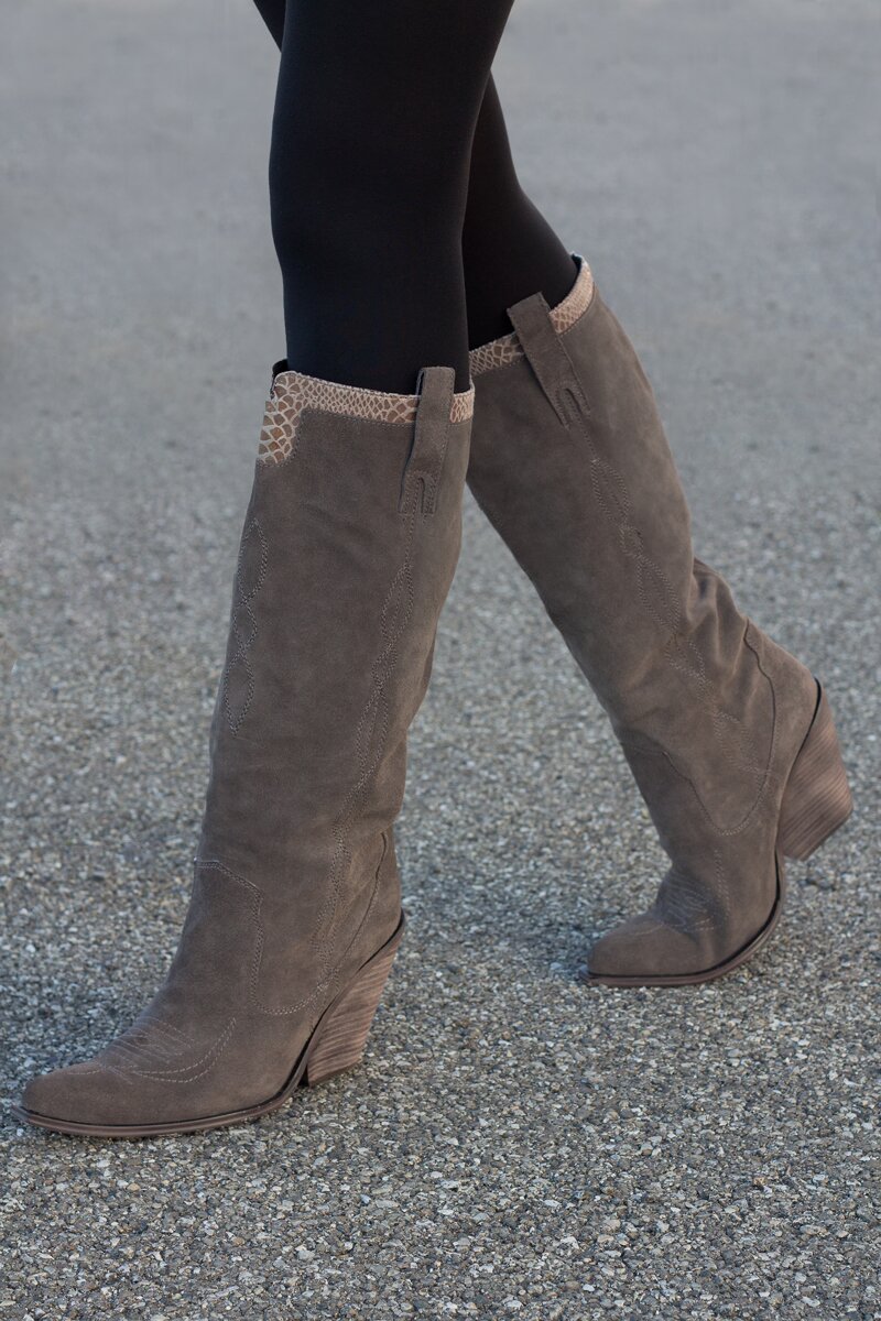 Fashion blogger Aurora Berill wearing a pair Pompili western leather boots