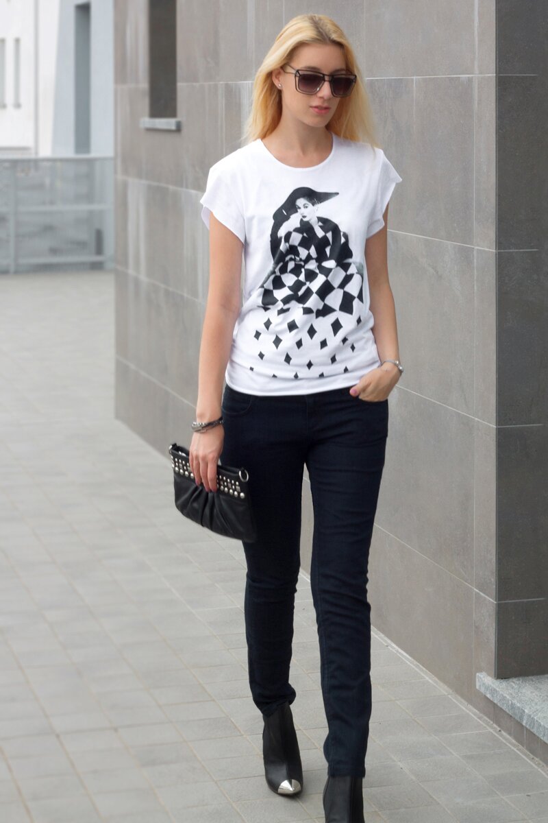 Fashion blogger Aurora Berill wearing capsule wardrobe staples