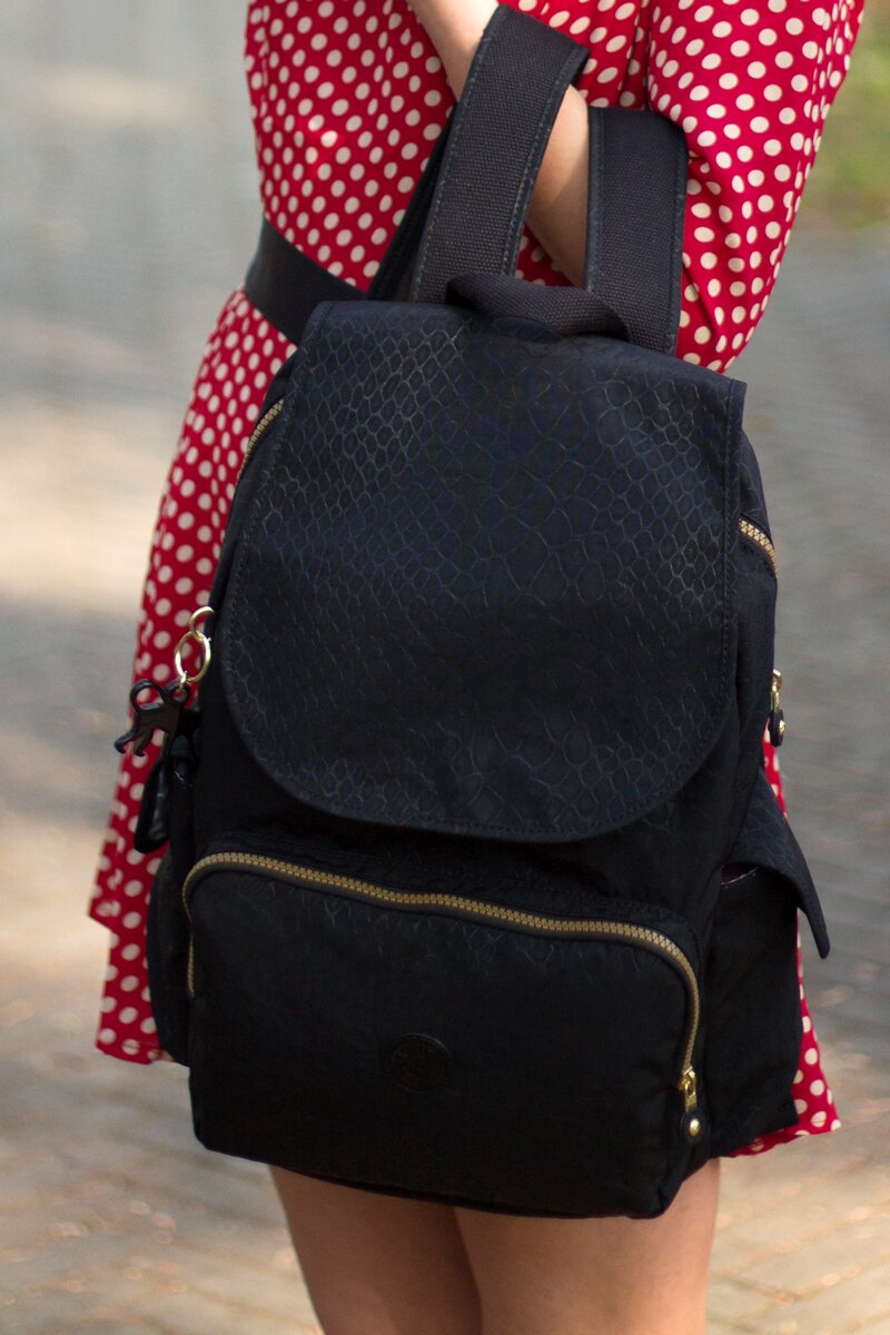 Fashion blogger Aurora Berill wearing a Kipling backpack from the selection of bigger Kipling backpacks