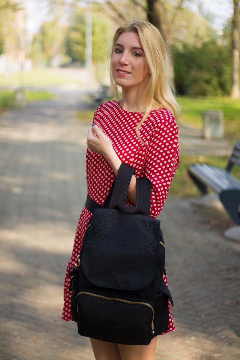 Fashion blogger Aurora Berill adding the Kipling backpack in her capsule wardrobe for traveling