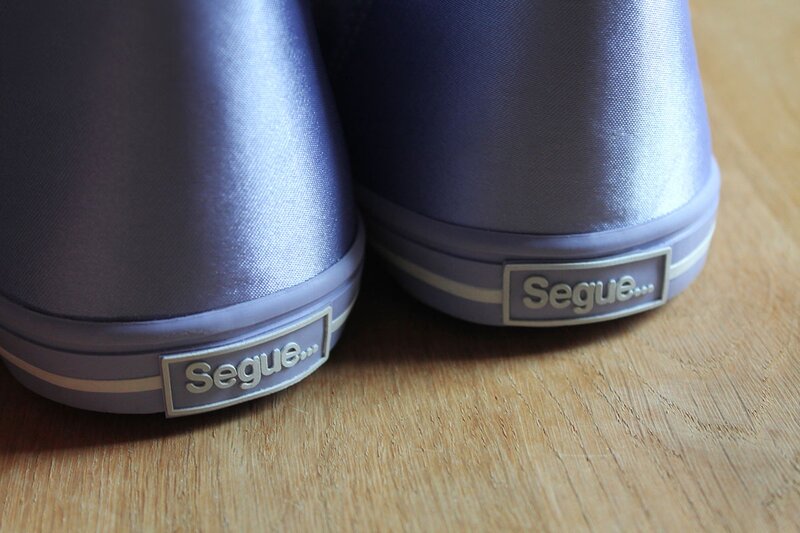 A pair of lilac blue sparkly glitter sneakers from Segue