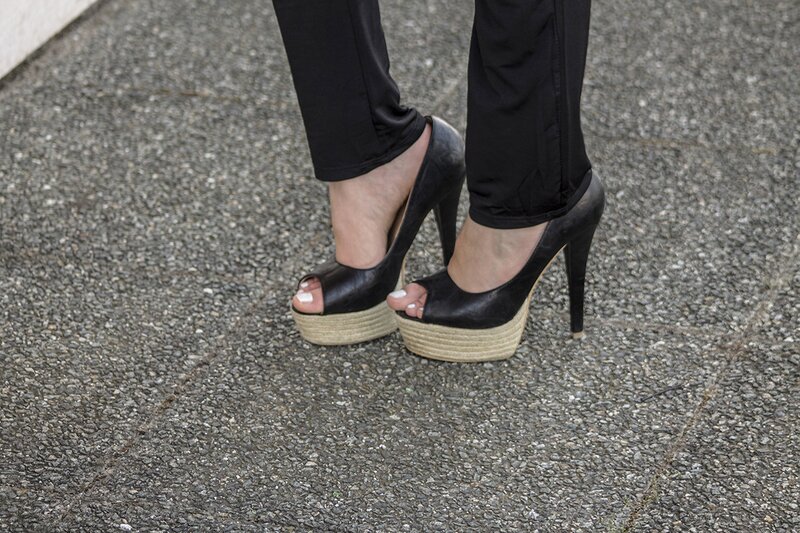 Fashion blogger Aurora Berill wearing open toe straw heels